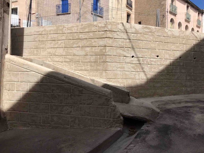 Réalisation d’un mur de soutenement en finition pierre de taille à Castelnau-de-Guers 